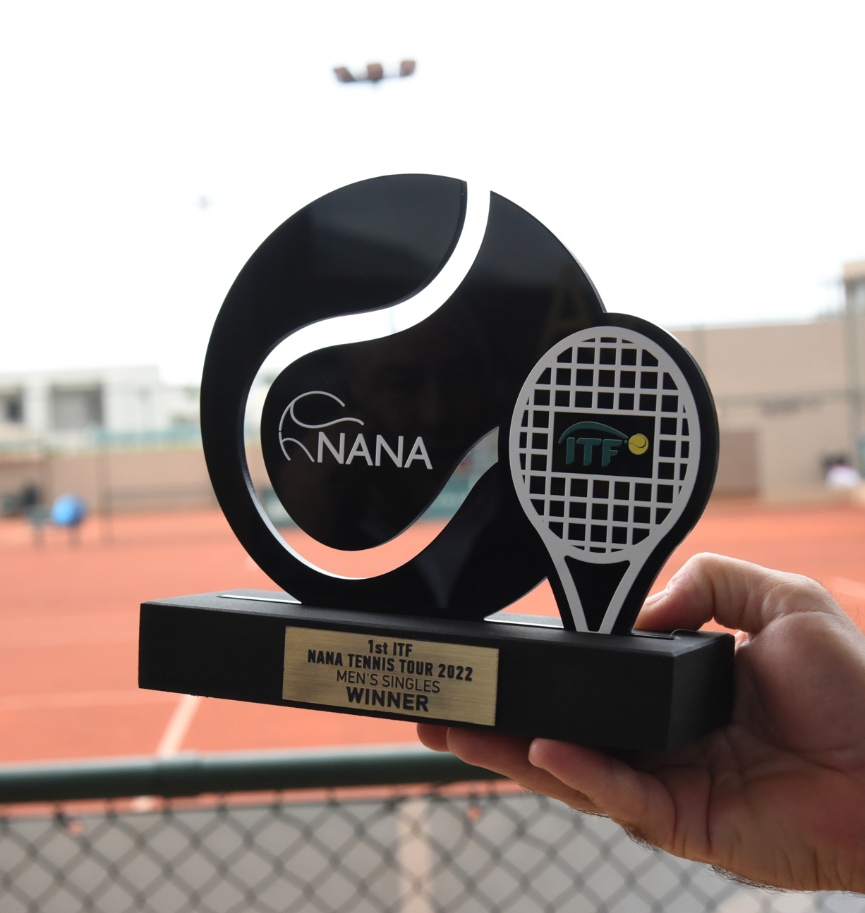 Nana Tennis ITF trophy