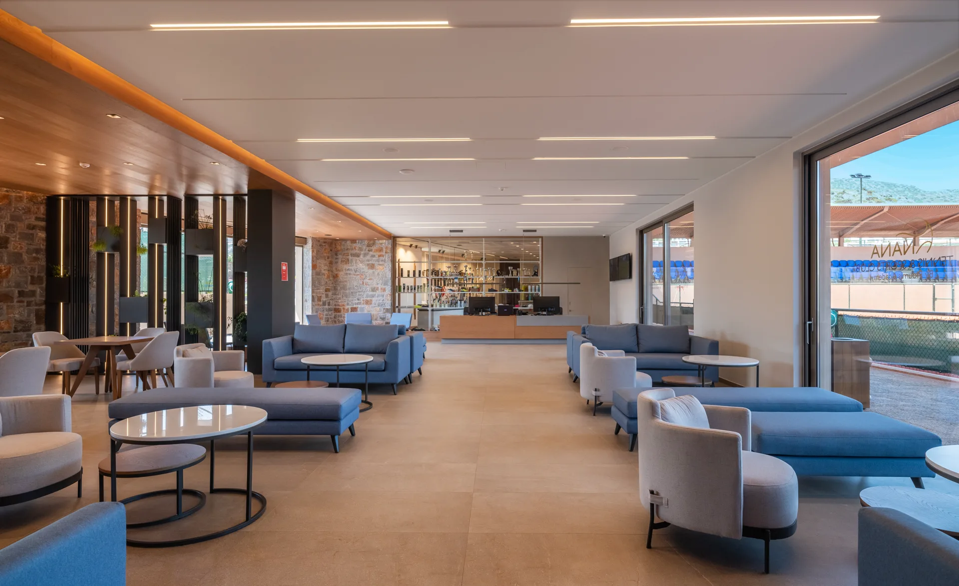 Club lounge and reception overlooking the tennis courts